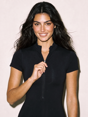 Ana Jumpsuit in Black, front close-up of zip and stand collar