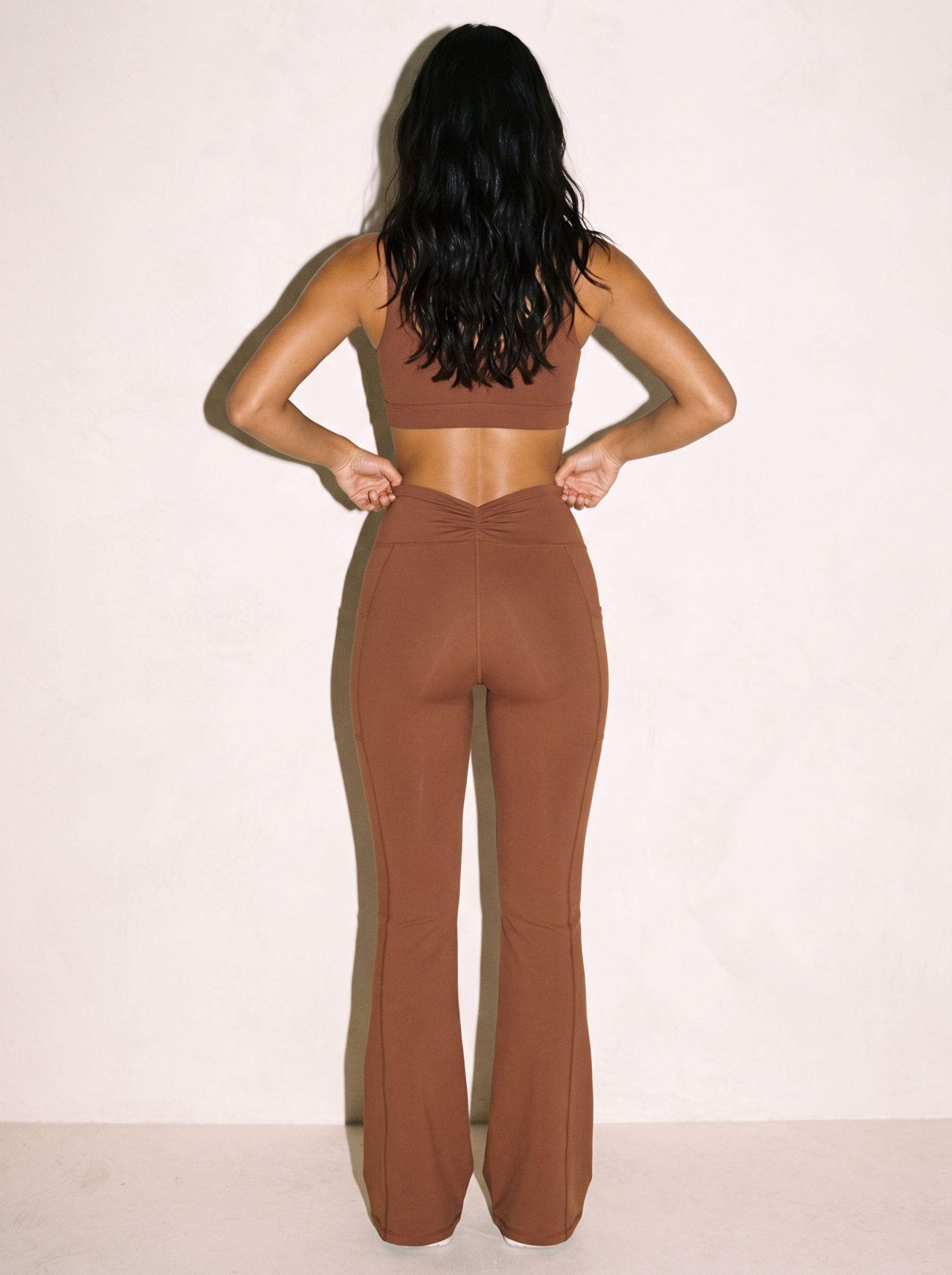 Silvia Flared Yoga Pants in Brown, back view