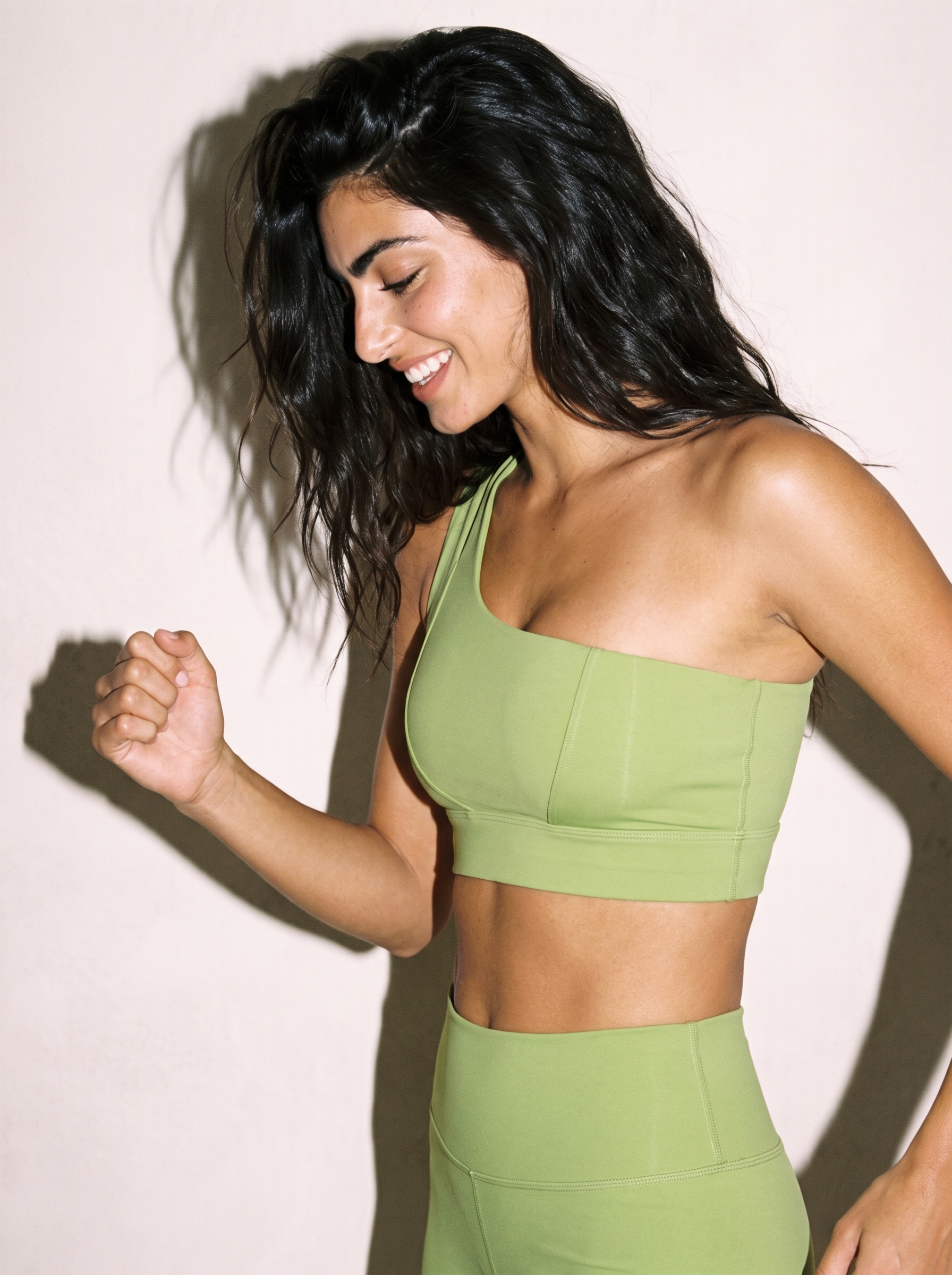 Agata Sports Bra in Grass Green, side close up